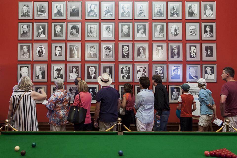 Visitors in the Billiard Room during an open house 