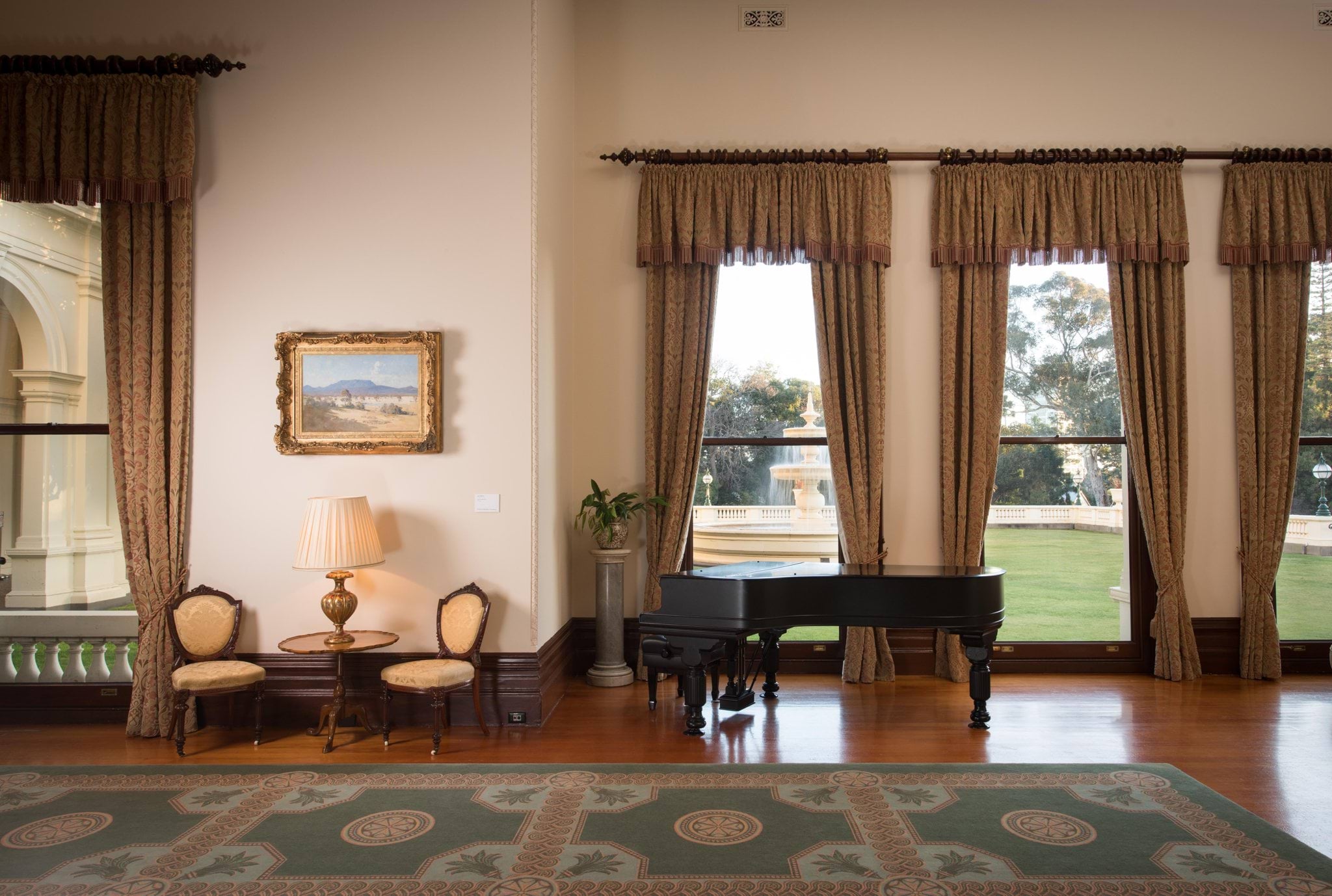 The State Drawing Room at Government House Victoria with a view towards the Fountain Court